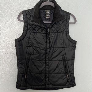 The North Face Zip up insulated vest.
